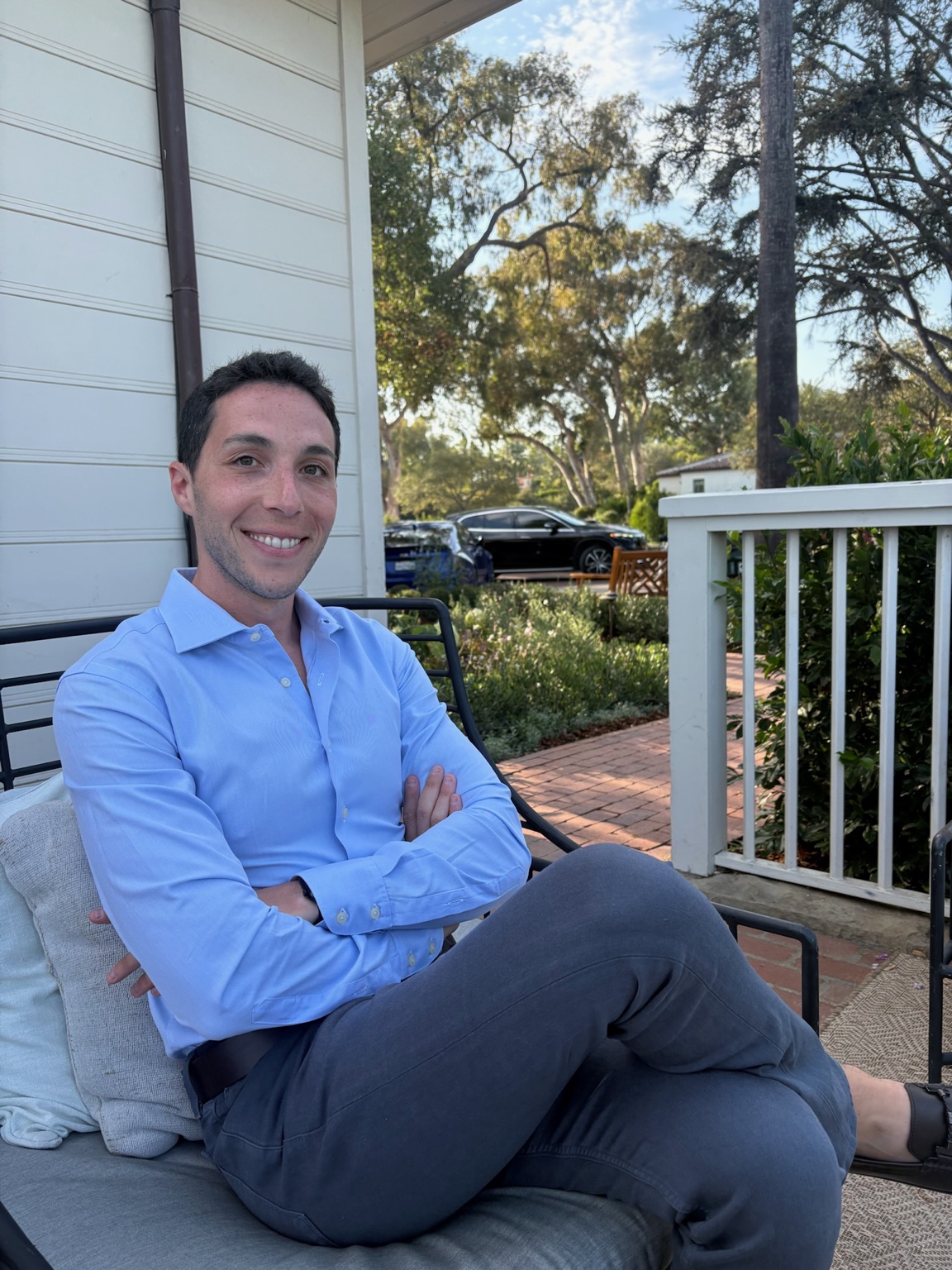Jeffrey Fenton seated outdoors